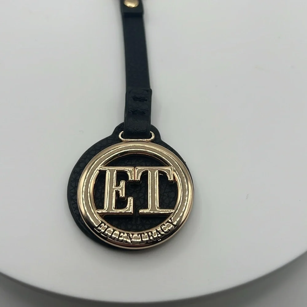 858. Ellen Tracy Black and Gold Keychain
